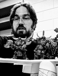 Michael Tracey repositioning miniatures in black and white